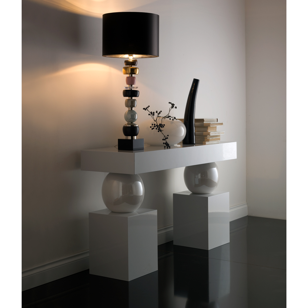 Console table with glossy white lacquered wooden bases and surface Hand turned and pearl white glazed majolica spheres